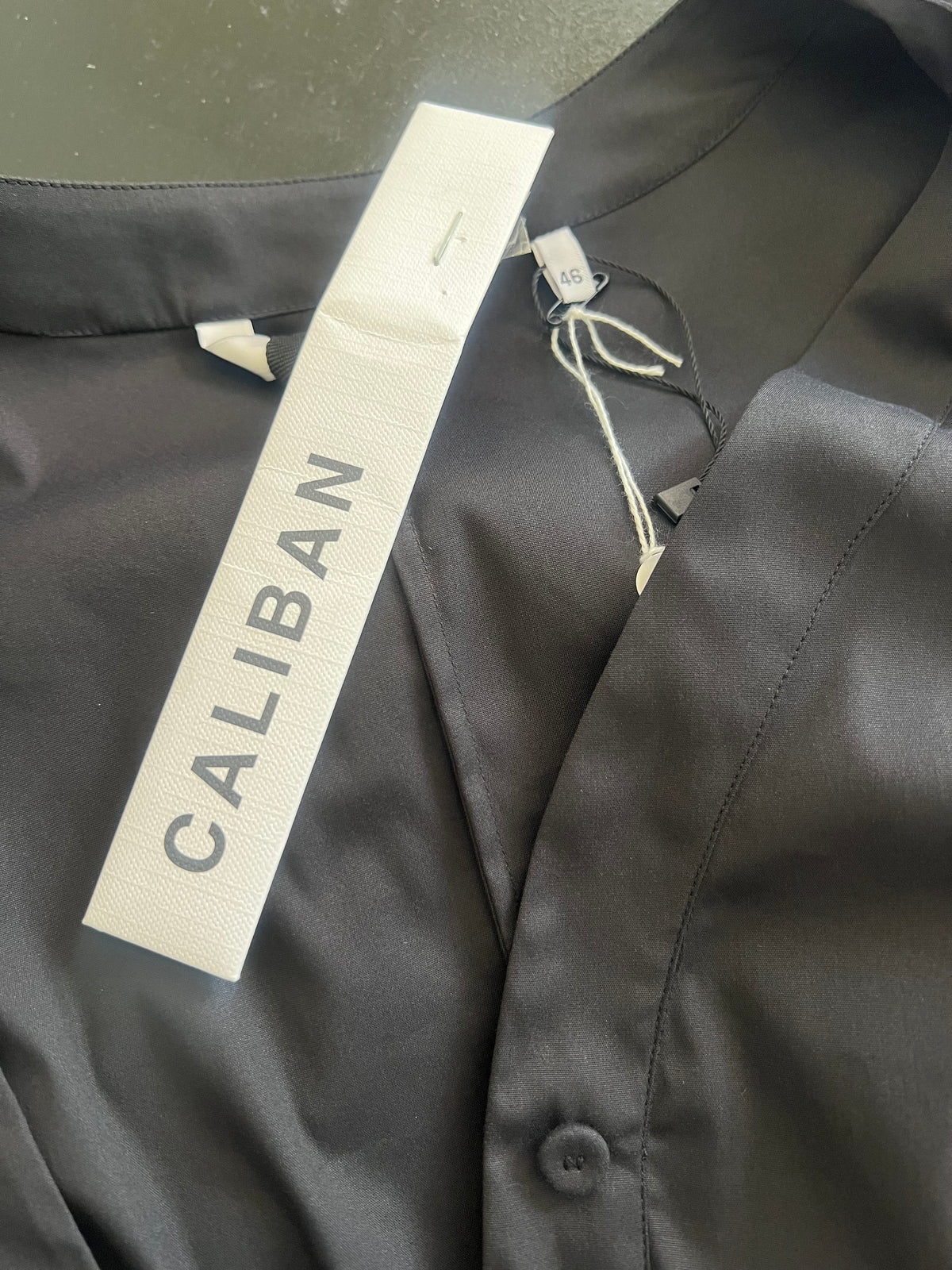 CALIBAN — Sculpted Peplum Blouse